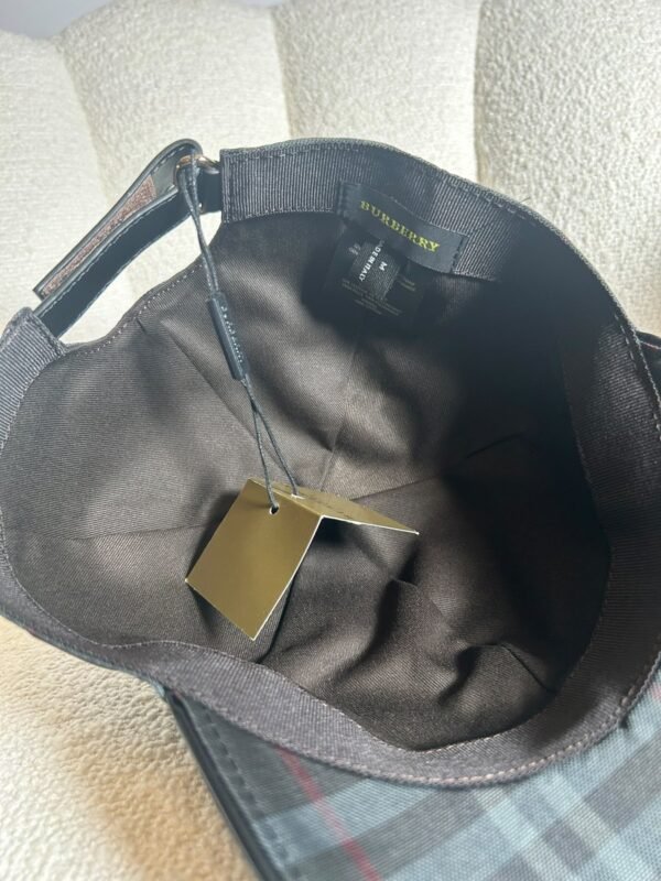 Burberry House check baseball cap in black, interior lining and label