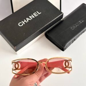 Chanel CH4024 oval sunglasses in gold-tone metal with pink lenses