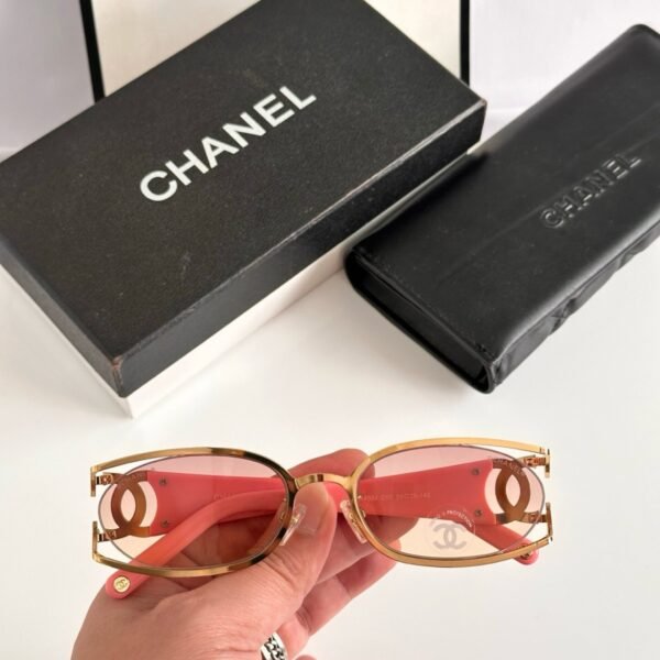 Chanel CH4024 oval sunglasses in gold-tone metal with pink lenses