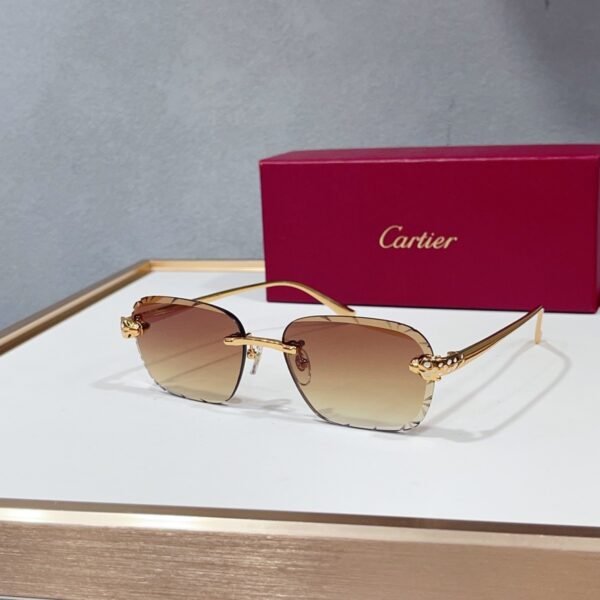Cartier CT7450S rimless sunglasses with brown gradient lenses and gold-tone panther temples