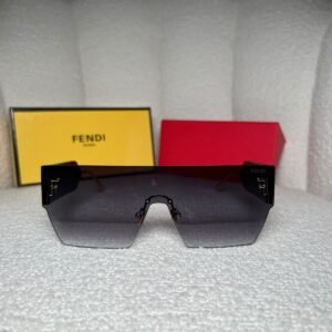 Black and gold rimless shield sunglasses with smoke-grey gradient lens