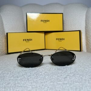 Silver rimless oval sunglasses with dark grey lenses