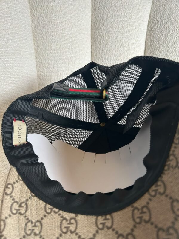 Gucci GG Supreme kingsnake trucker cap, interior lining and authenticity tag