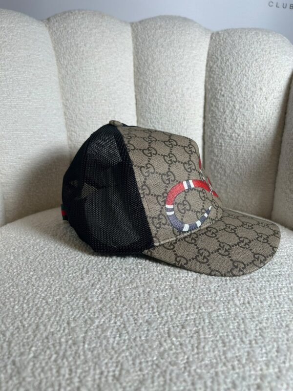 Gucci GG Supreme kingsnake trucker cap, side view with mesh back
