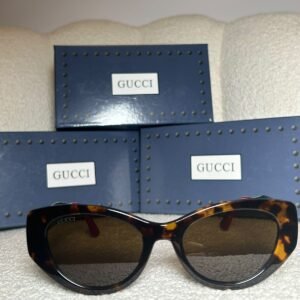 Tortoiseshell cat-eye sunglasses with brown gradient lenses