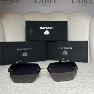 Gold rimless angular sunglasses with smoke gradient lenses