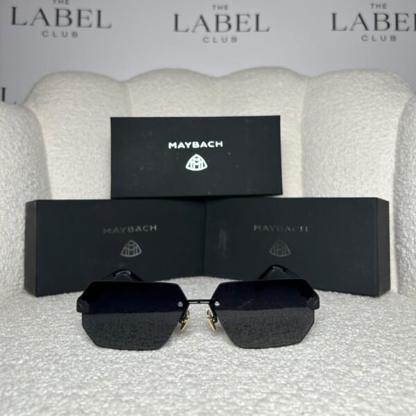 Black rimless angular sunglasses with dark smoke lenses