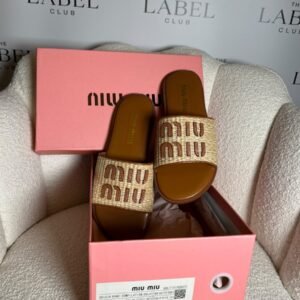 Miu Miu raffia logo slides in tan