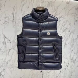 Moncler Tibb down gilet in navy — glossy quilted nylon with stand collar and chest logo patch